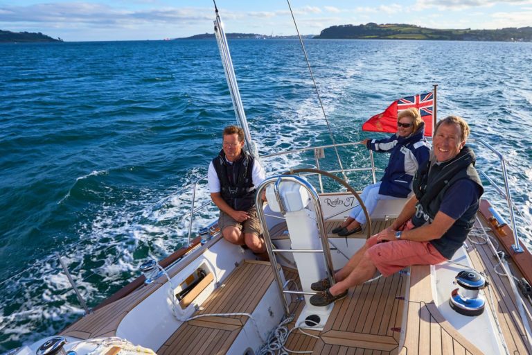 Rustler 37 - Tim Stevenson (r) on board Andrillot II with his wife, Mary, and Rustler’s Adrian Jones